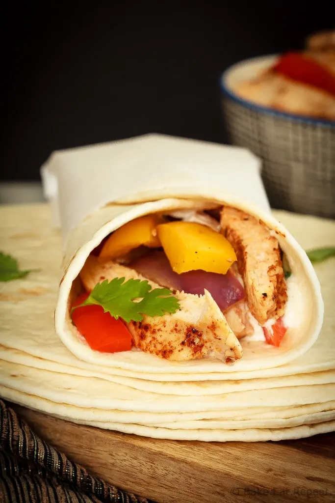 Quick and easy chicken fajitas with just one sheet pan to clean afterwards! This is my new favourite way to make one of my family's favourite meals!