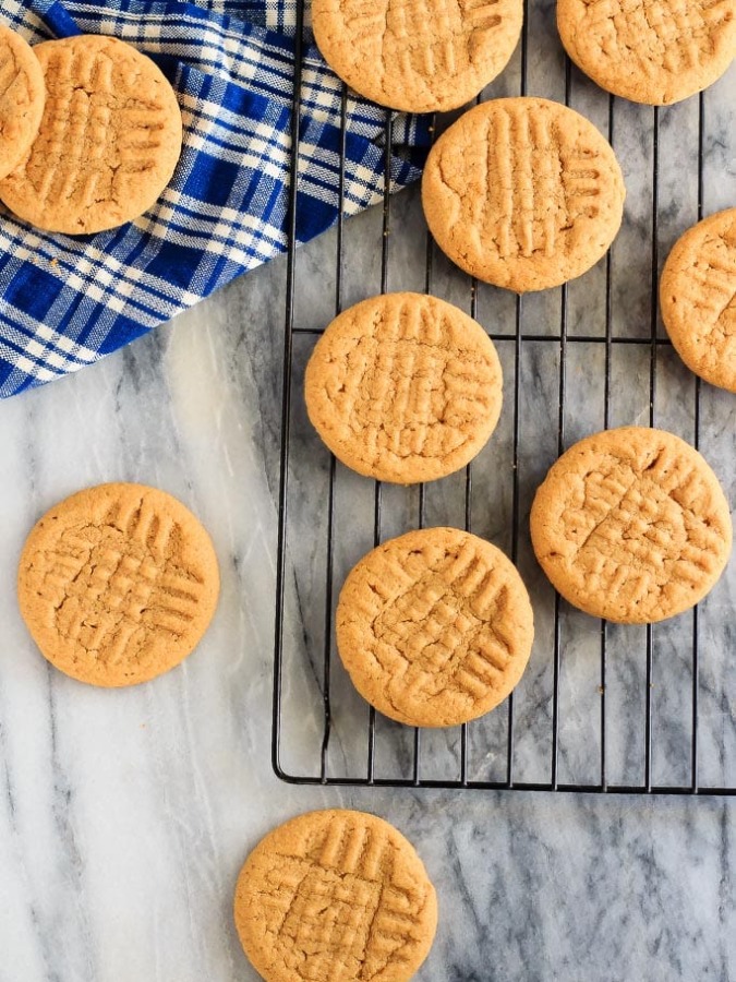 These soft and chewy, 3 ingredient peanut butter cookies are full of peanut butter flavour. Plus they're flourless, use just one bowl and minutes to make!