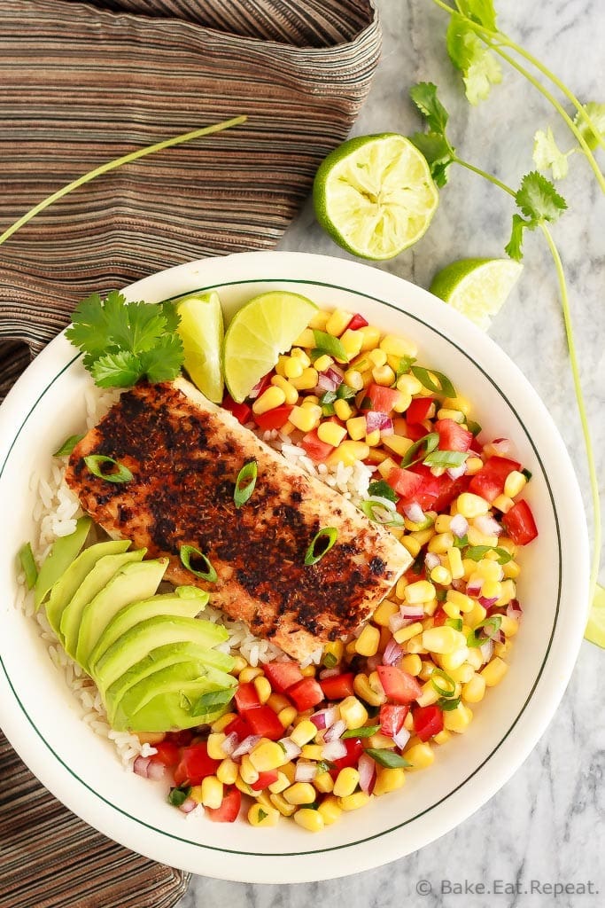 These blackened fish taco bowls with corn salsa are quickly becoming a family favourite! Spicy fish, fresh avocado, and corn salsa served on hot rice. So good!