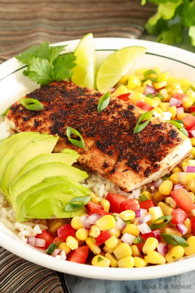 These blackened fish taco bowls with corn salsa are quickly becoming a family favourite! Spicy fish, fresh avocado, and corn salsa served on hot rice. So good!