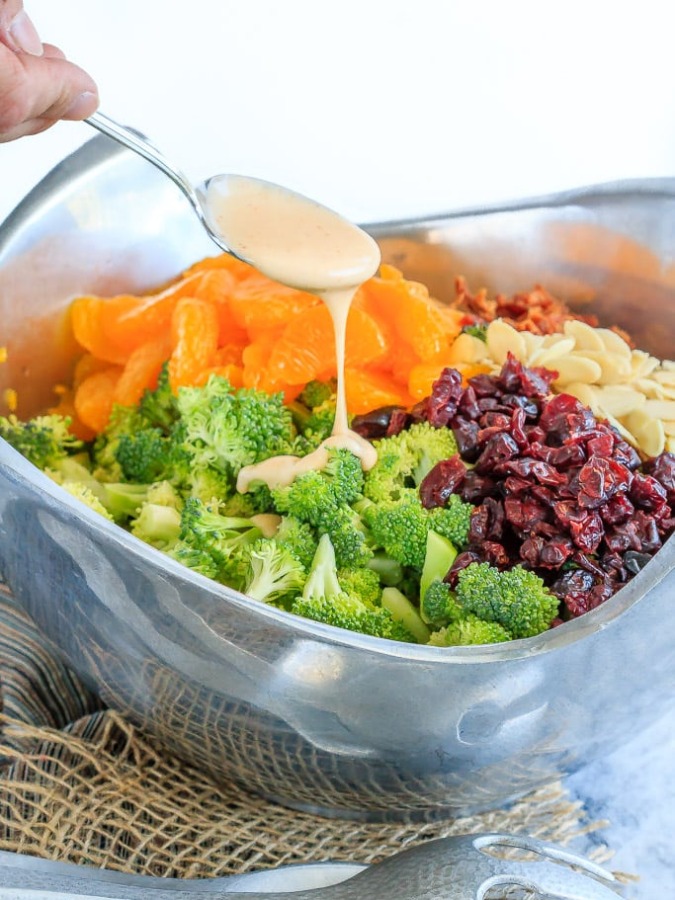 This broccoli salad makes the perfect side dish to bring to a BBQ or potluck - it's quick and easy to make and everyone loves it! And it can be made ahead of time!