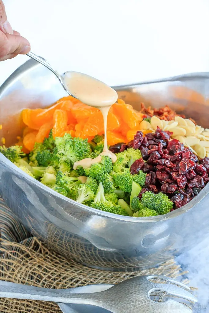 This broccoli salad makes the perfect side dish to bring to a BBQ or potluck - it's quick and easy to make and everyone loves it! And it can be made ahead of time!