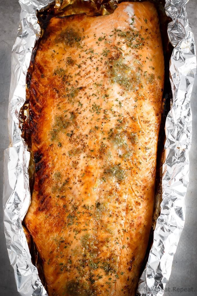 This honey lemon baked salmon with a sunflower kale salad is quick and easy to make and you will love it! A 30 minute meal you'll make again and again!