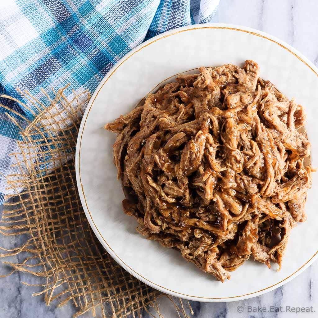 This tender maple balsamic pork tenderloin takes just minutes to get into the slow cooker and is amazing piled onto a soft roll for an easy dinner!