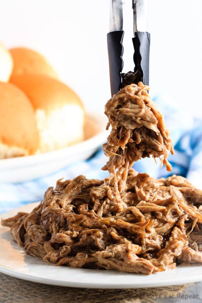 This tender maple balsamic pork tenderloin takes just minutes to get into the slow cooker and is amazing piled onto a soft roll for an easy dinner!