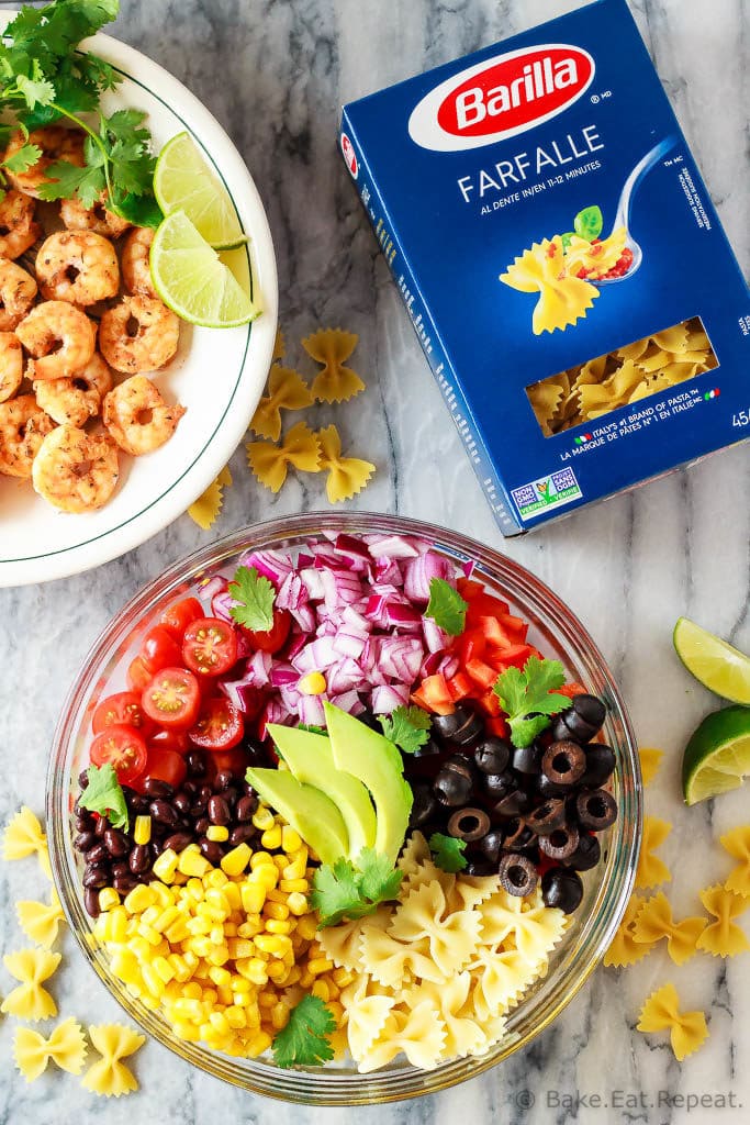 This Mexican pasta salad with cajun shrimp is perfect for summer - easy to make, the whole family will love it, and it can even be made ahead of time!