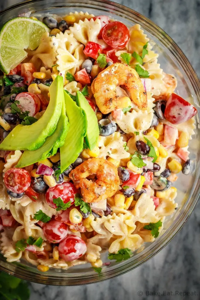 This Mexican pasta salad with cajun shrimp is perfect for summer - easy to make, the whole family will love it, and it can even be made ahead of time!