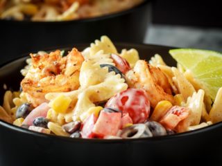 This Mexican pasta salad with cajun shrimp is perfect for summer - easy to make, the whole family will love it, and it can even be made ahead of time!