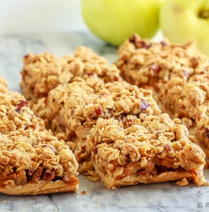 These easy to make apple pie bars have a shortbread crust, a cinnamon crumb topping and an amazing apple pie filling - the perfect fall dessert!