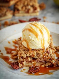 These easy to make apple pie bars have a shortbread crust, a cinnamon crumb topping and an amazing apple pie filling - the perfect fall dessert!