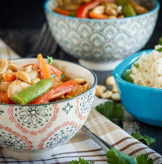 A quick and easy weeknight meal, this peanut chicken stir fry is filled with veggies and an amazing homemade peanut sauce - plus it's ready in 30 minutes!