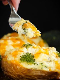 These twice baked potatoes filled with cheddar cheese and broccoli are the perfect side dish - they're easy to make and the whole family will love them!