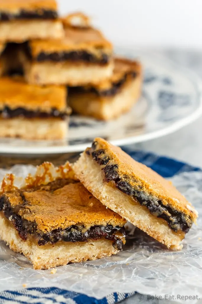 These butter tart squares are butter tarts in bar form - a shortbread base with a sweet topping made with butter, sugar and currants. Perfect for your holiday baking!