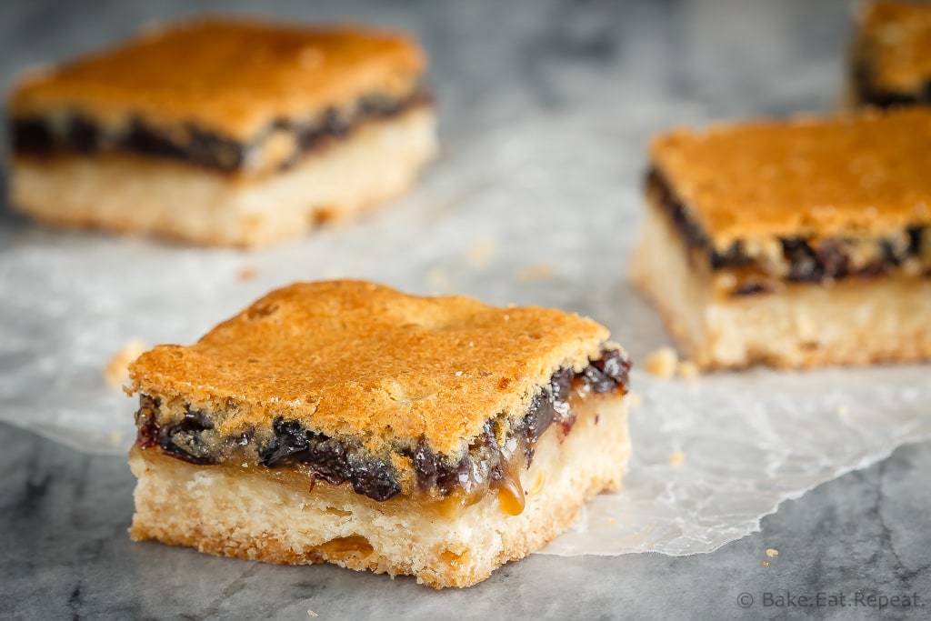 These butter tart squares are butter tarts in bar form - a shortbread base with a sweet topping made with butter, sugar and currants. Perfect for your holiday baking!