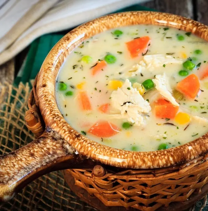 This chicken pot pie soup is thick and creamy (without any cream!) and ready to eat in 30 minutes - a great way to use up chicken (or turkey) leftovers!