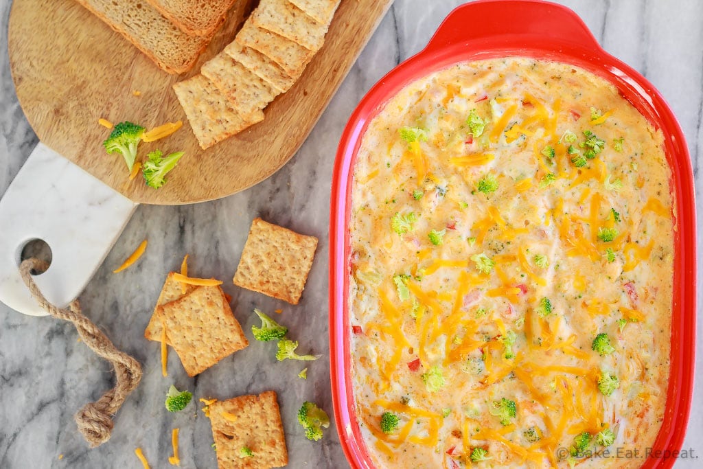 This hot, baked broccoli cheese dip is easy to mix up and can be made ahead of time. Everyone will love this appetizer served with crackers, chips or veggies!