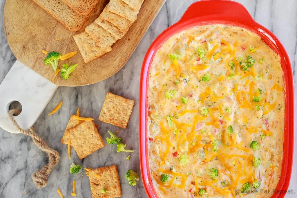 This hot, baked broccoli cheese dip is easy to mix up and can be made ahead of time. Everyone will love this appetizer served with crackers, chips or veggies!