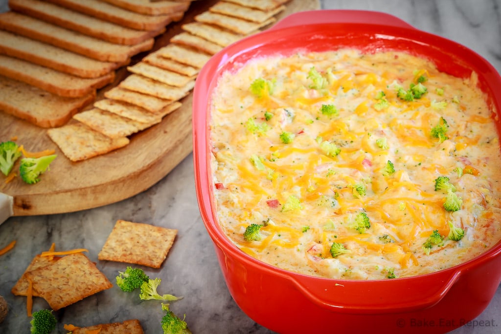 This hot, baked broccoli cheese dip is easy to mix up and can be made ahead of time. Everyone will love this appetizer served with crackers, chips or veggies!