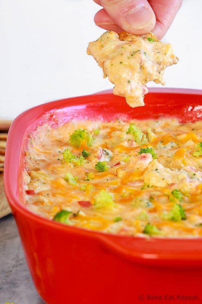 This hot, baked broccoli cheese dip is easy to mix up and can be made ahead of time. Everyone will love this appetizer served with crackers, chips or veggies!