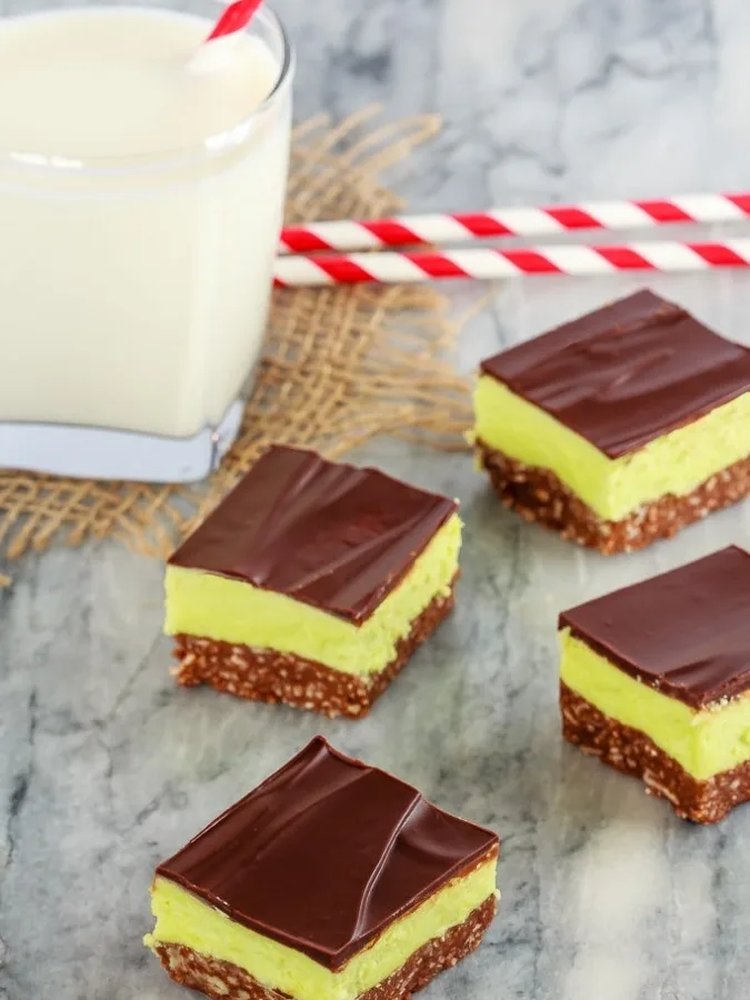 These mint Nanaimo bars are an easy to make, no bake treat that is perfect for your Christmas cookie tray. Perfect dessert with a big glass of milk!