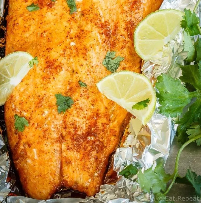 A tasty 30 minute meal that the whole family will love, this chili lime baked salmon comes together quickly and is absolutely delicious!