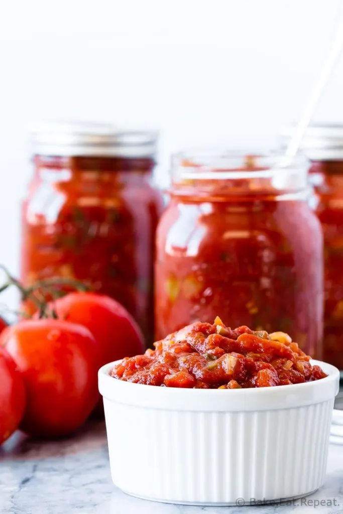 This homemade salsa is so much better then anything you can buy at the store, and is easy to make. You can even can it at home with a water bath canner so you can enjoy fresh tasting, homemade salsa all year long! (It also freezes well if canning isn't your thing!)