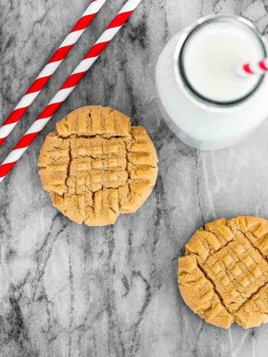 These classic peanut butter cookies are a bit crisp and crumbly, full of peanut butter flavour, and super easy to make. They have that classic cross hatch pattern on top, and are the perfect snack or dessert!