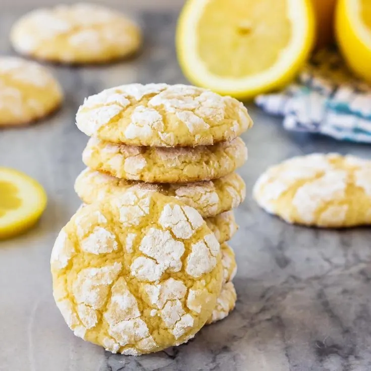 This easy recipe makes soft lemon cookies that are perfectly chewy. Coat them in powdered sugar before baking for lemon crinkle cookies everyone will love!