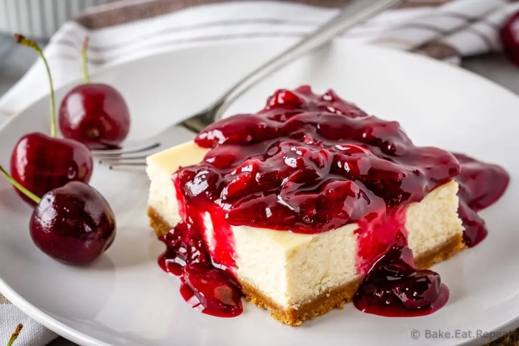 These easy cherry cheesecake bars make the perfect summer dessert - decadent cheesecake topped with a fresh cherry sauce!