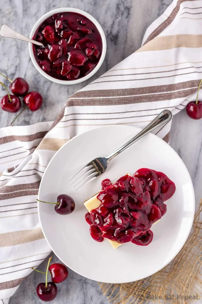 These easy cherry cheesecake bars make the perfect summer dessert - decadent cheesecake topped with a fresh cherry sauce!