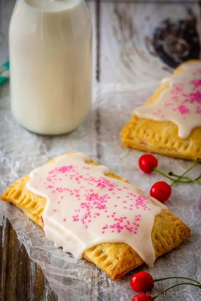 These cherry pop tarts are easy to make, and make the best dessert or snack. Flaky homemade pastry wrapped around a sweet cherry filling - so good!