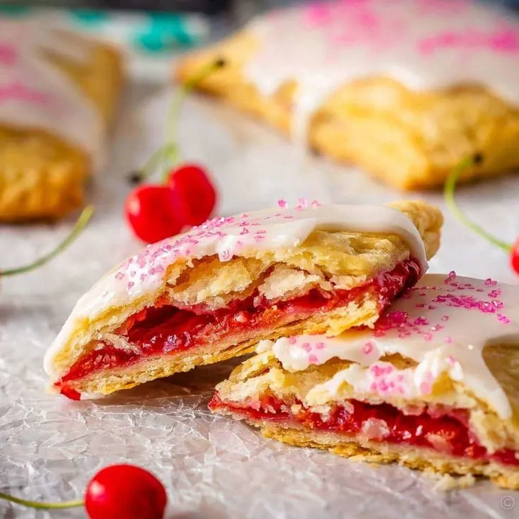 These cherry pop tarts are easy to make, and make the best dessert or snack. Flaky homemade pastry wrapped around a sweet cherry filling - so good!