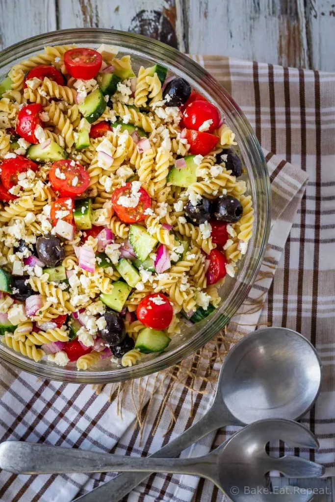 This Greek pasta salad is the perfect side dish - quick and easy to make and everyone loves it! Add protein like chicken or shrimp to make it a full meal!