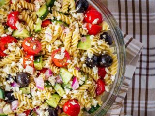 This Greek pasta salad is the perfect side dish - quick and easy to make and everyone loves it! Add protein like chicken or shrimp to make it a full meal!