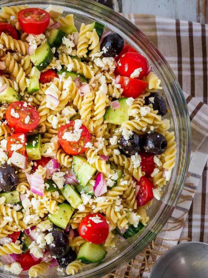 This Greek pasta salad is the perfect side dish - quick and easy to make and everyone loves it! Add protein like chicken or shrimp to make it a full meal!