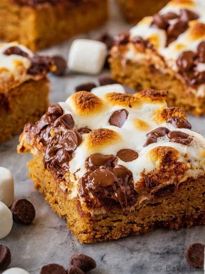 These s'mores bars are the best way to enjoy s'mores without a campfire! Quick and easy to make, they make the perfect dessert or snack!