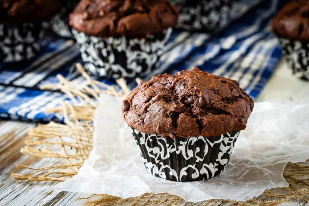 These chocolate zucchini muffins are a great way to use up all that garden zucchini! Moist, chocolatey, delicious muffins that everyone will love!