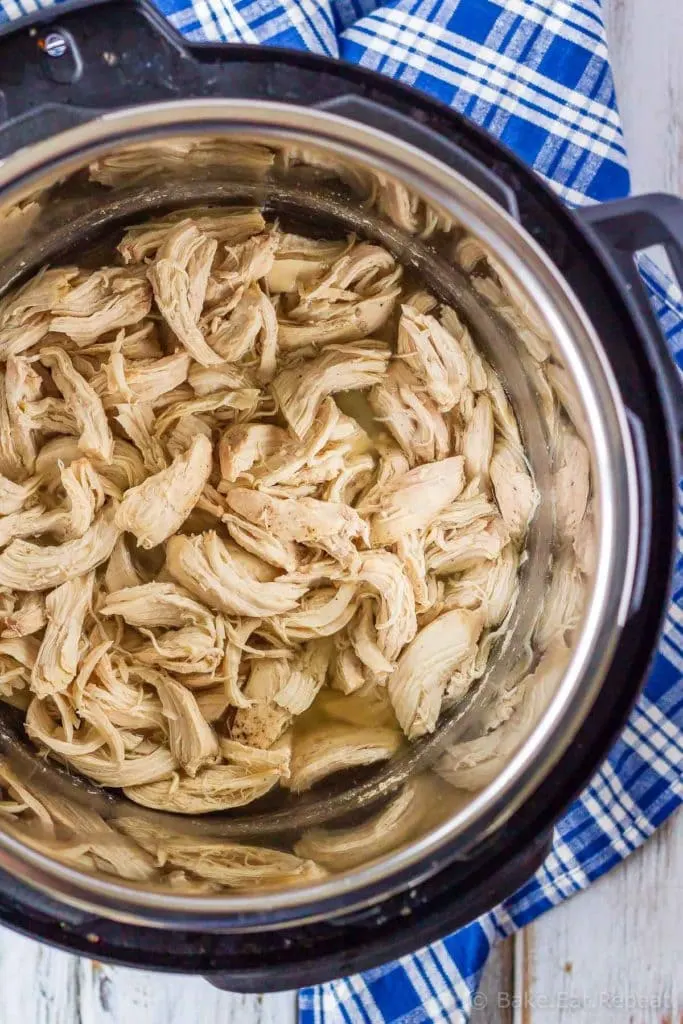 Easy to make, Instant Pot shredded chicken - you can pressure cook chicken breasts for cooked, shredded chicken in minutes - with fresh or frozen chicken!