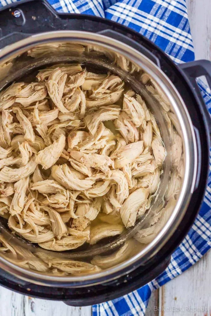 Easy to make, Instant Pot shredded chicken - you can pressure cook chicken breasts for cooked, shredded chicken in minutes - with fresh or frozen chicken!