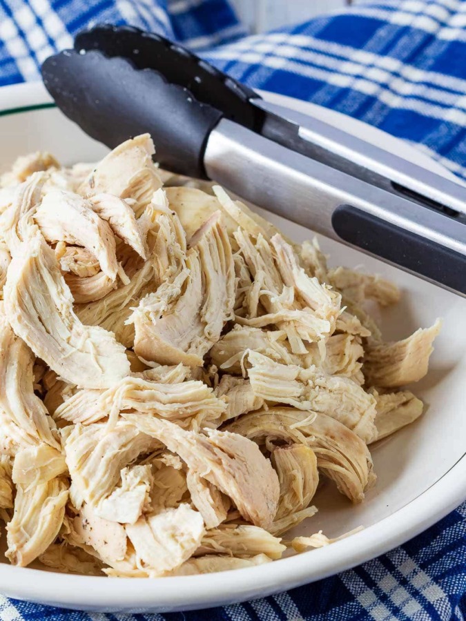 Easy to make, Instant Pot shredded chicken - you can pressure cook chicken breasts for cooked, shredded chicken in minutes - with fresh or frozen chicken!