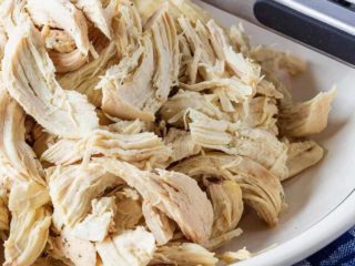 Easy to make, Instant Pot shredded chicken - you can pressure cook chicken breasts for cooked, shredded chicken in minutes - with fresh or frozen chicken!