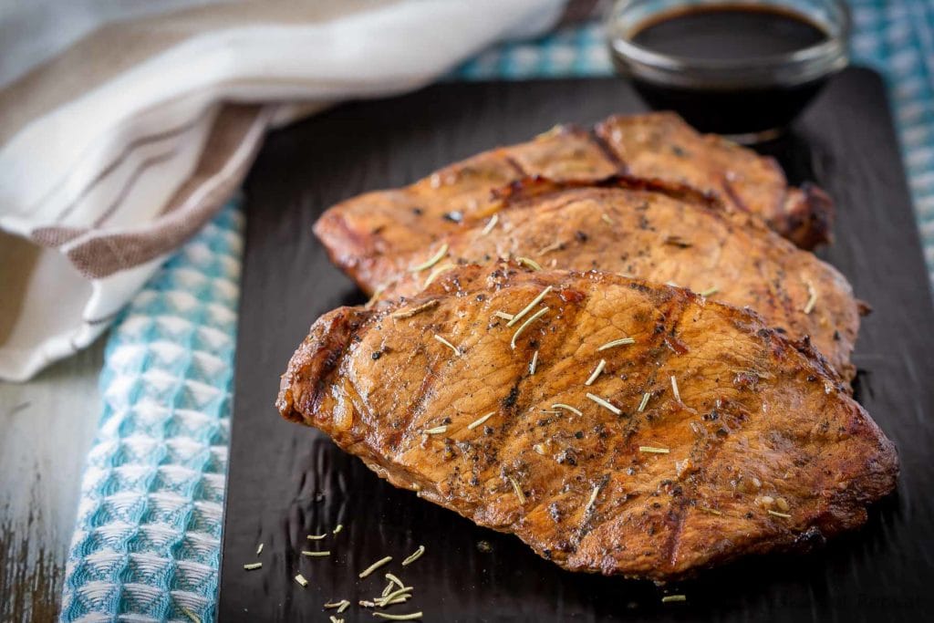 This balsamic pork chop marinade is easy to mix up and adds so much flavour to pork chops. Marinate and then grill, pan fry, or bake, or freeze for later!