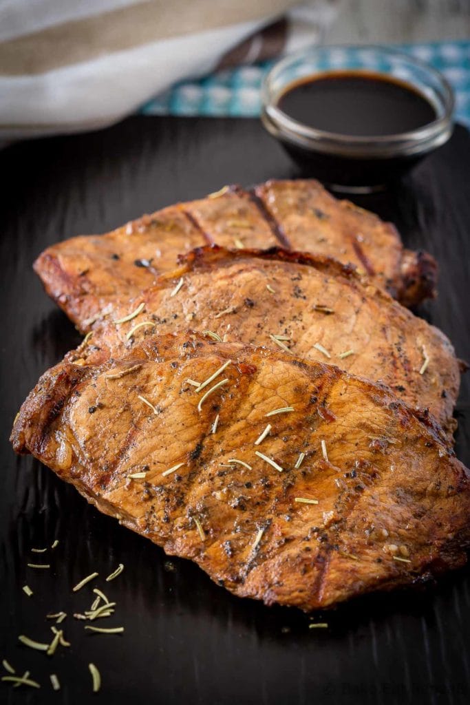 This balsamic pork chop marinade is easy to mix up and adds so much flavour to pork chops. Marinate and then grill, pan fry, or bake, or freeze for later!