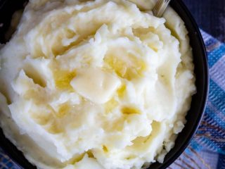 Creamy Instant Pot mashed potatoes are so fast and easy to make, and can even be made ahead of time - the perfect side dish for Thanksgiving!