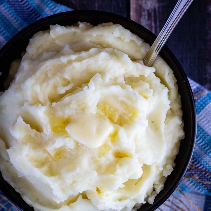 Creamy Instant Pot mashed potatoes are so fast and easy to make, and can even be made ahead of time - the perfect side dish for Thanksgiving!