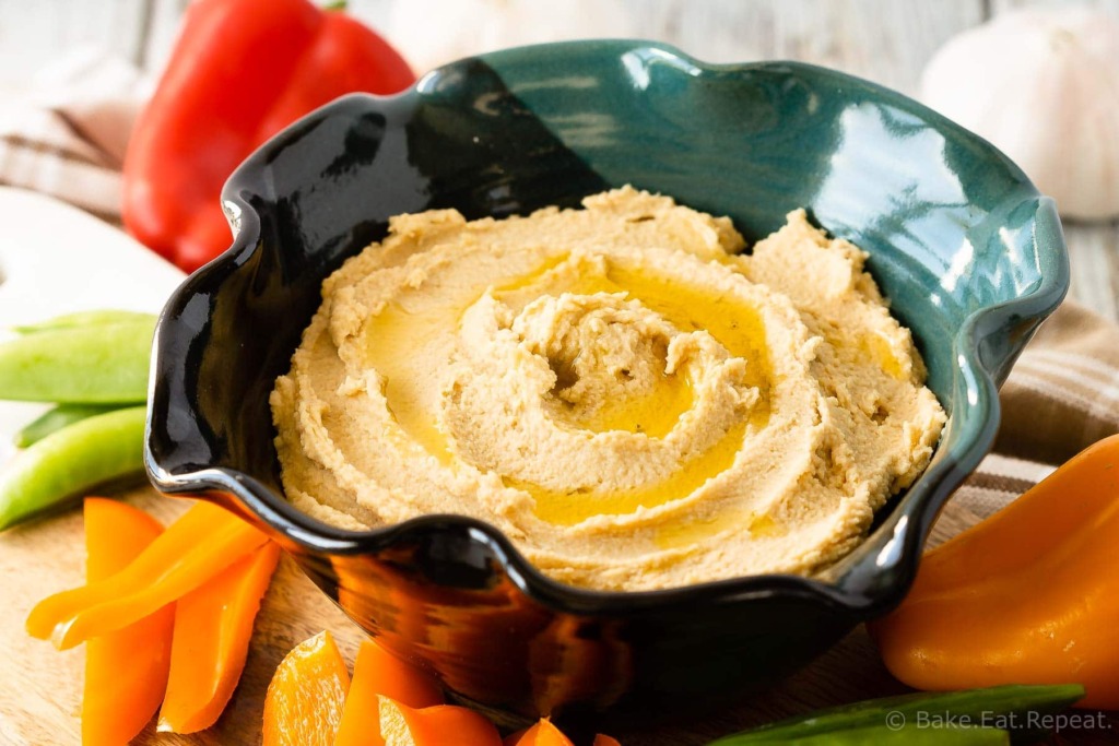 This easy roasted garlic hummus is silky smooth and full of roasted garlic flavour. Quick and easy to make, this homemade hummus is the perfect snack!