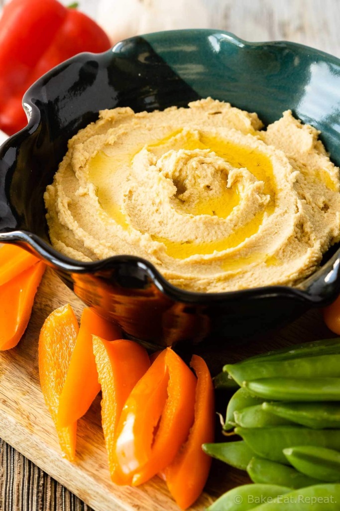 This easy roasted garlic hummus is silky smooth and full of roasted garlic flavour. Quick and easy to make, this homemade hummus is the perfect snack!