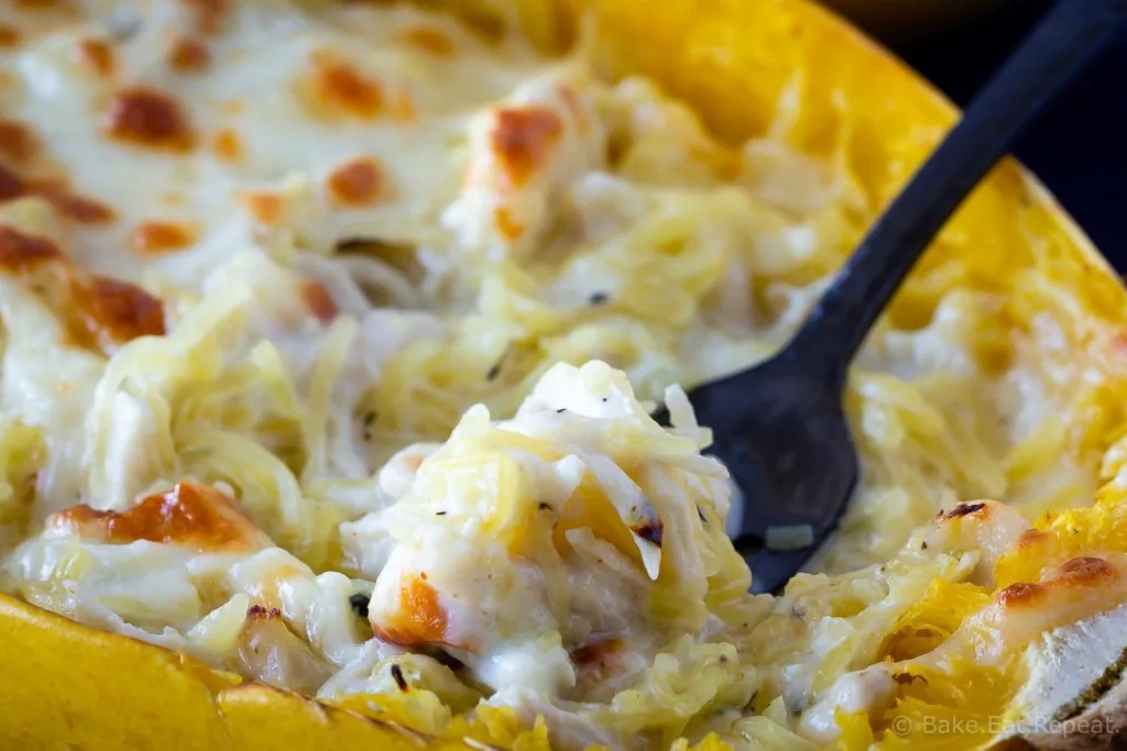 Easy to make, healthy chicken alfred stuffed spaghetti squash.