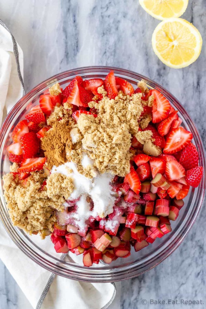 Bowl of ingredients for making strawberry rhubarb crisp