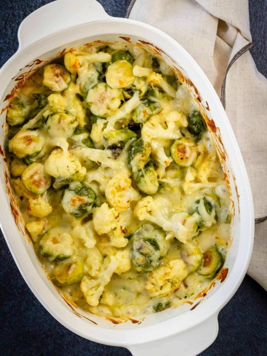 Cheesy Roasted Brussel Sprouts and Cauliflower